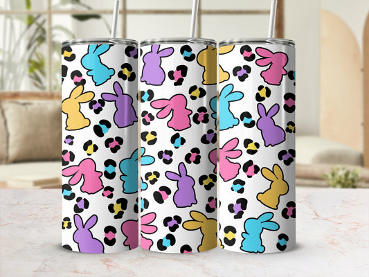 Three tumblers with a colorful bunny and leopard print pattern.