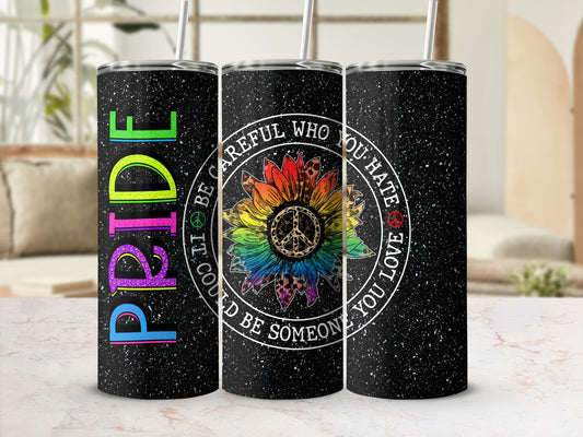 Black tumbler with rainbow pride text and a peace sign sunflower.