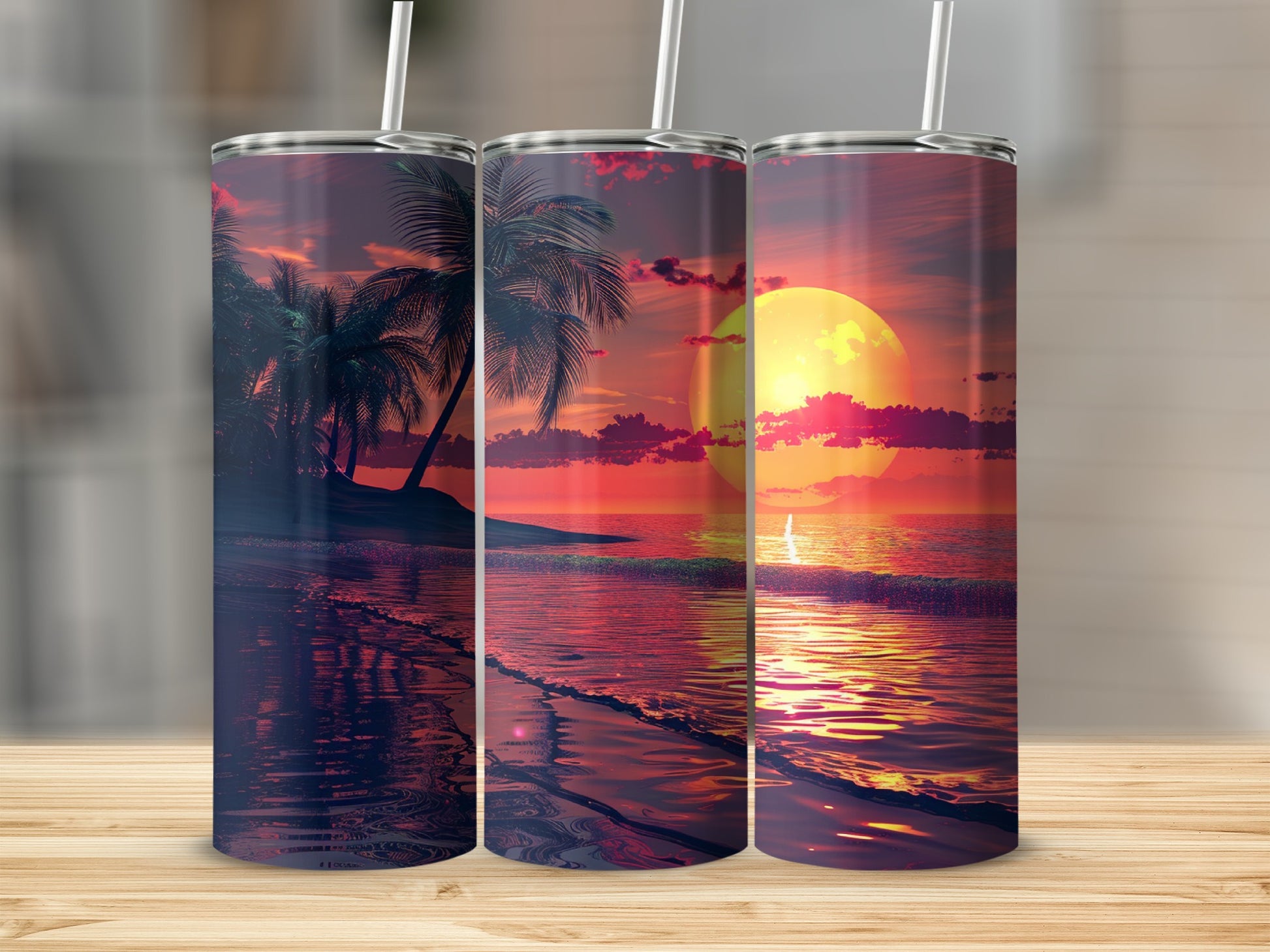 Three tumblers with a sunset beach scene and palm trees.