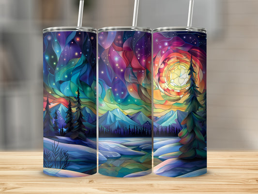 Three tumblers with colorful stained-glass winter landscape designs.