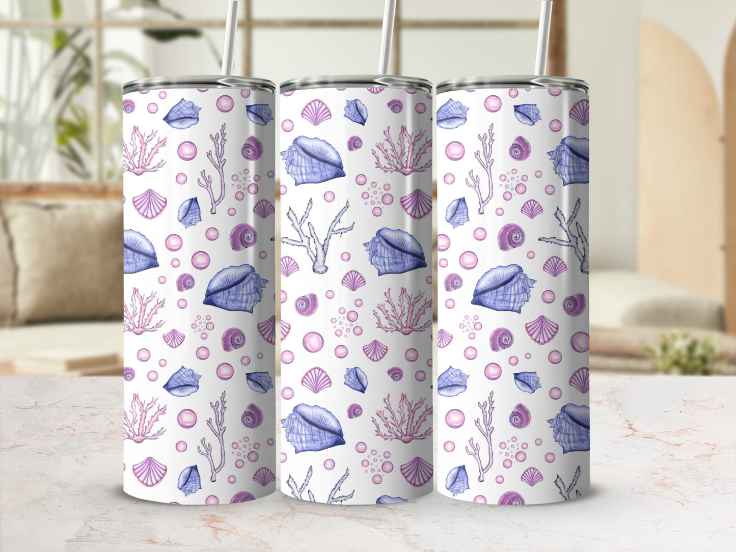 Tumbler with watercolor seashells, coral, and bubbles pattern.