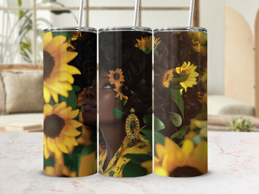 Sunflower tumbler with woman's face and floral design.