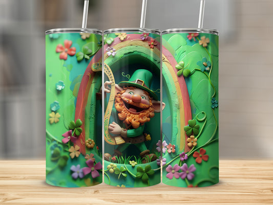 Leprechaun playing harp under rainbow on green St. Patrick's Day tumbler.