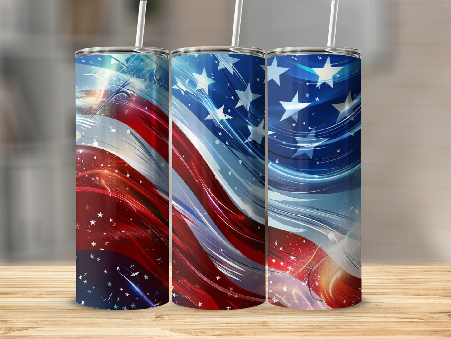 Three tumblers with a patriotic American flag design on a wooden surface.