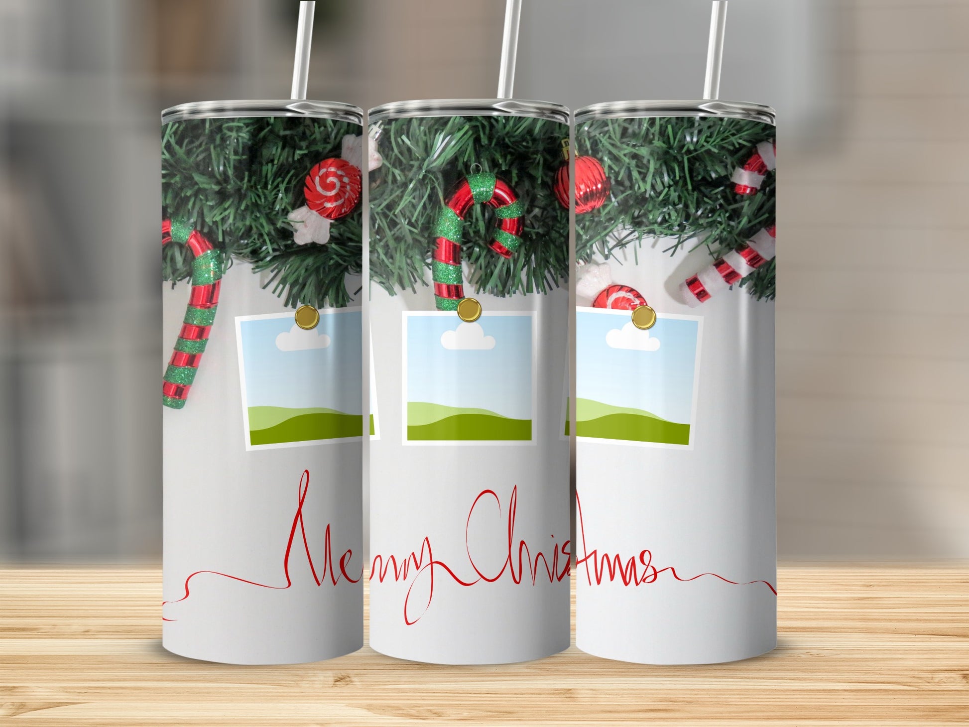 Three tumblers with Christmas decorations and "Merry Christmas" text.