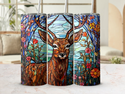 Stained glass tumbler with deer and floral background.