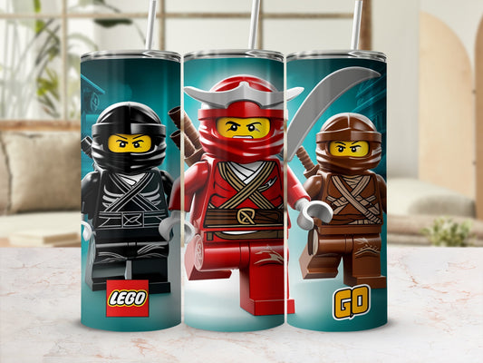 Three LEGO Ninjago characters in red, black, and brown outfits on tumblers.
