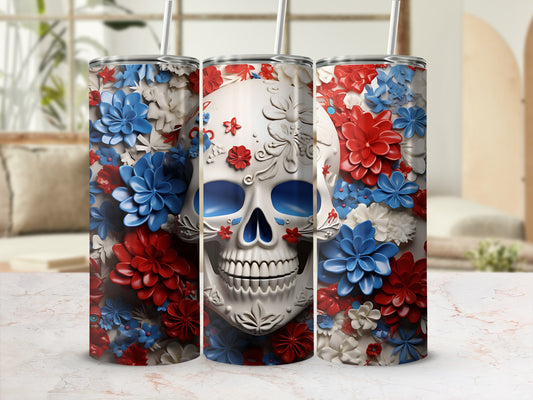 Three tumblers featuring a white skull design with red and blue flowers.