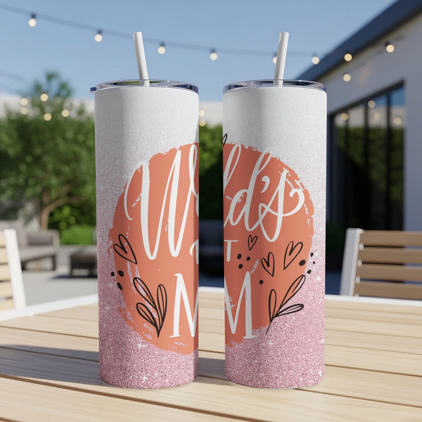 Two skinny tumblers with "World's Best Mom" text and floral accents.