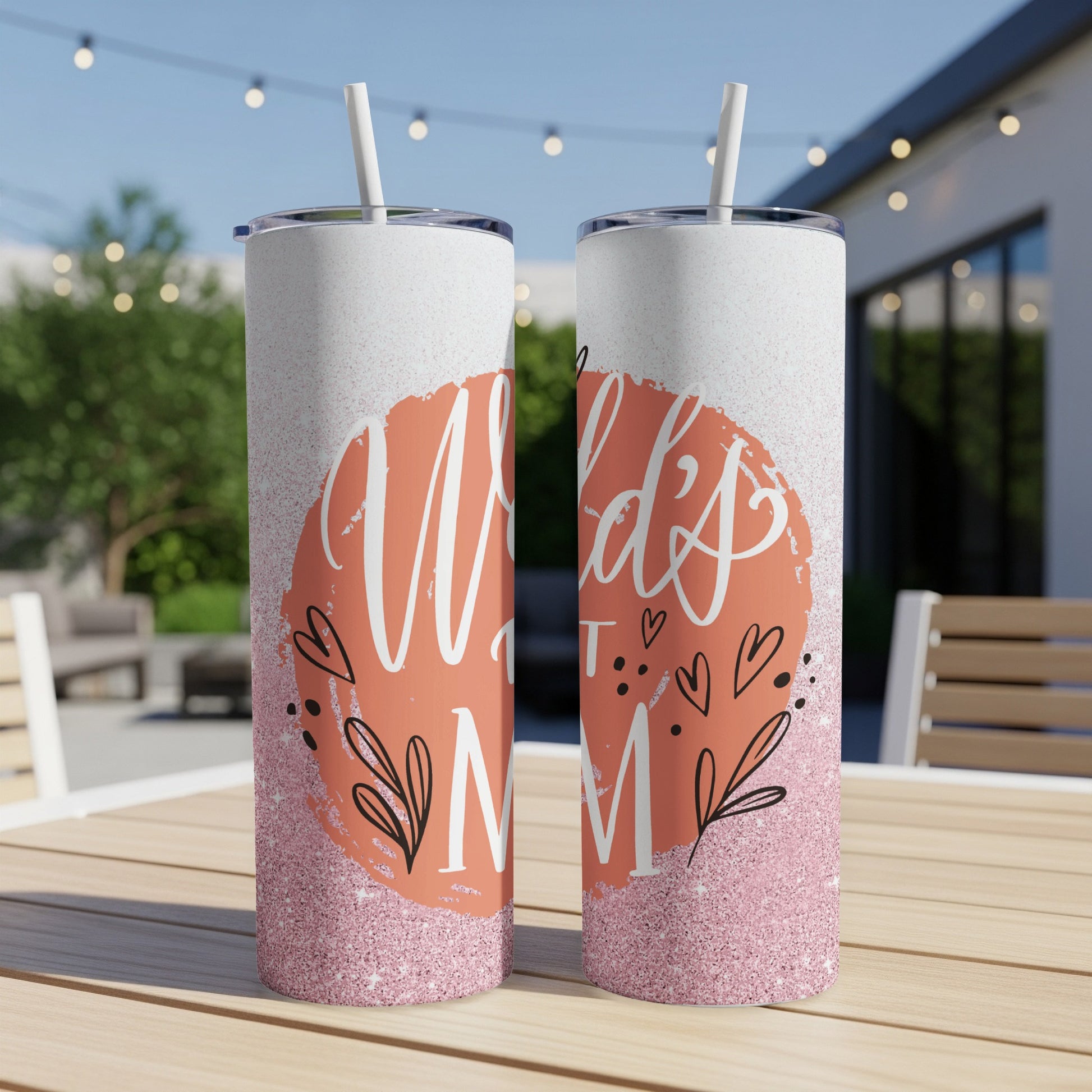 Two skinny tumblers with "World's Best Mom" text and floral accents.