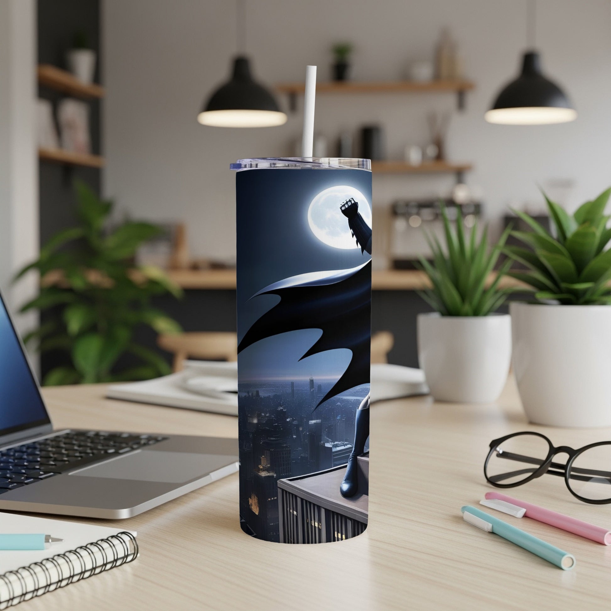 Batman silhouette on skyscraper overlooking city, on a tumbler.
