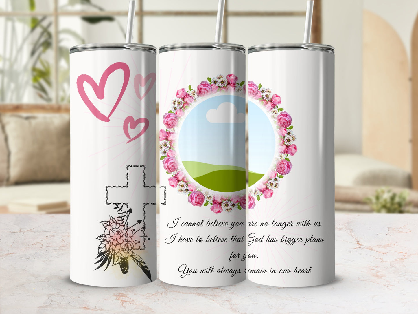 Three tumblers with pink hearts, a cross with flowers, and floral wreath designs.