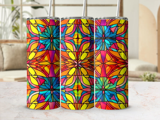 Three colorful stained-glass patterned tumblers with straws.