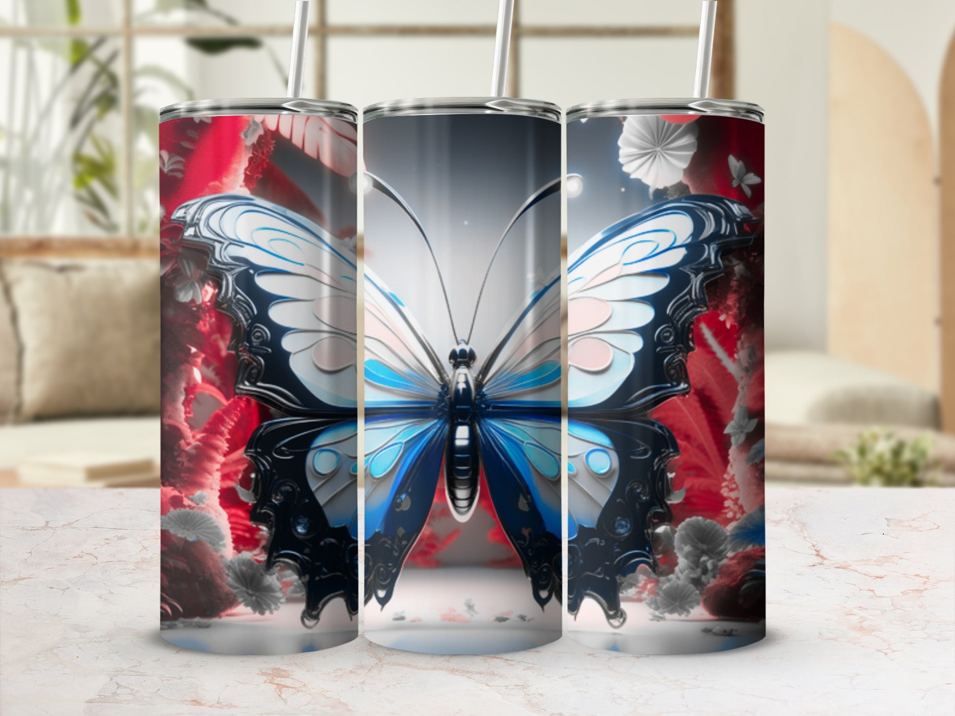 Butterfly design on a red and silver tumbler with two straws.