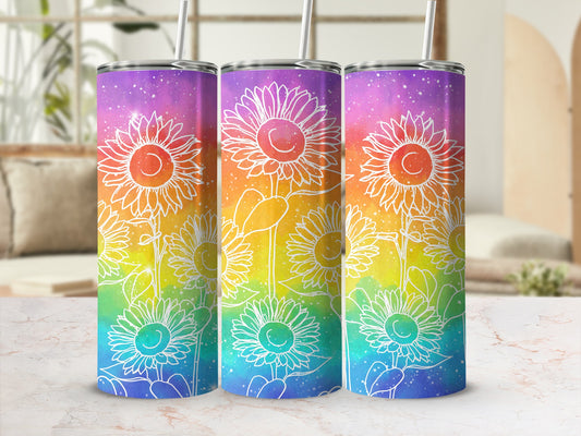 Rainbow gradient tumbler with white outline sunflowers and straws.