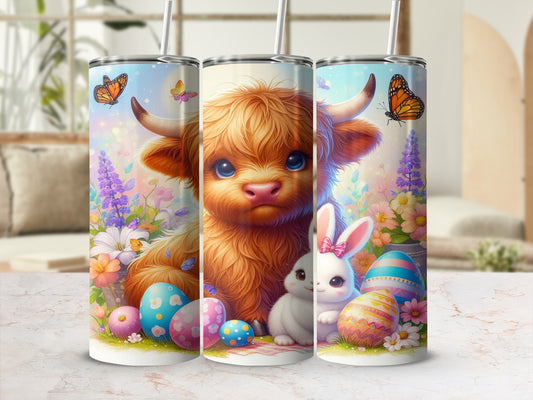 Easter tumbler with a fluffy cow, bunny, and decorated eggs.