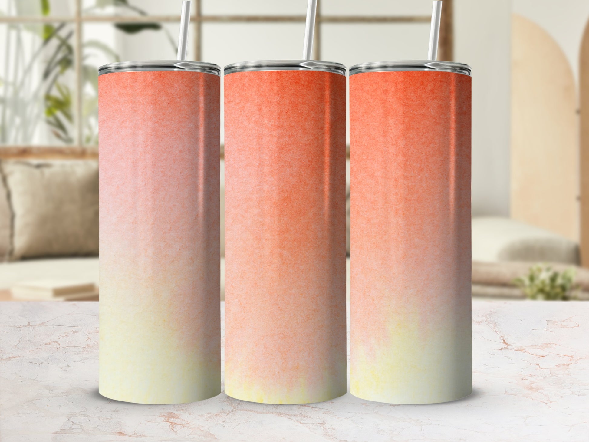 Three tumblers with an orange and yellow gradient design.