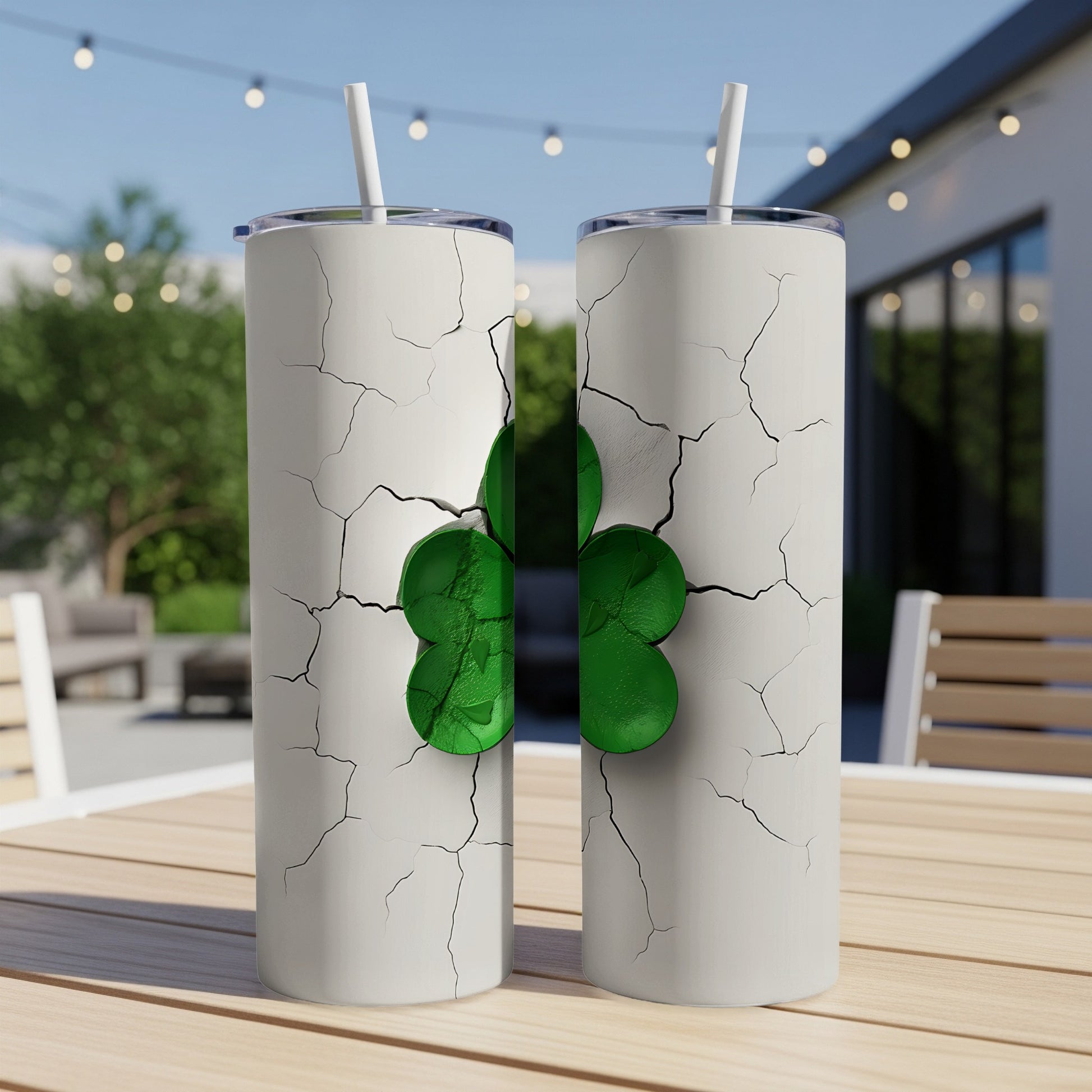 Two white tumblers with cracked ice texture and a green shamrock.