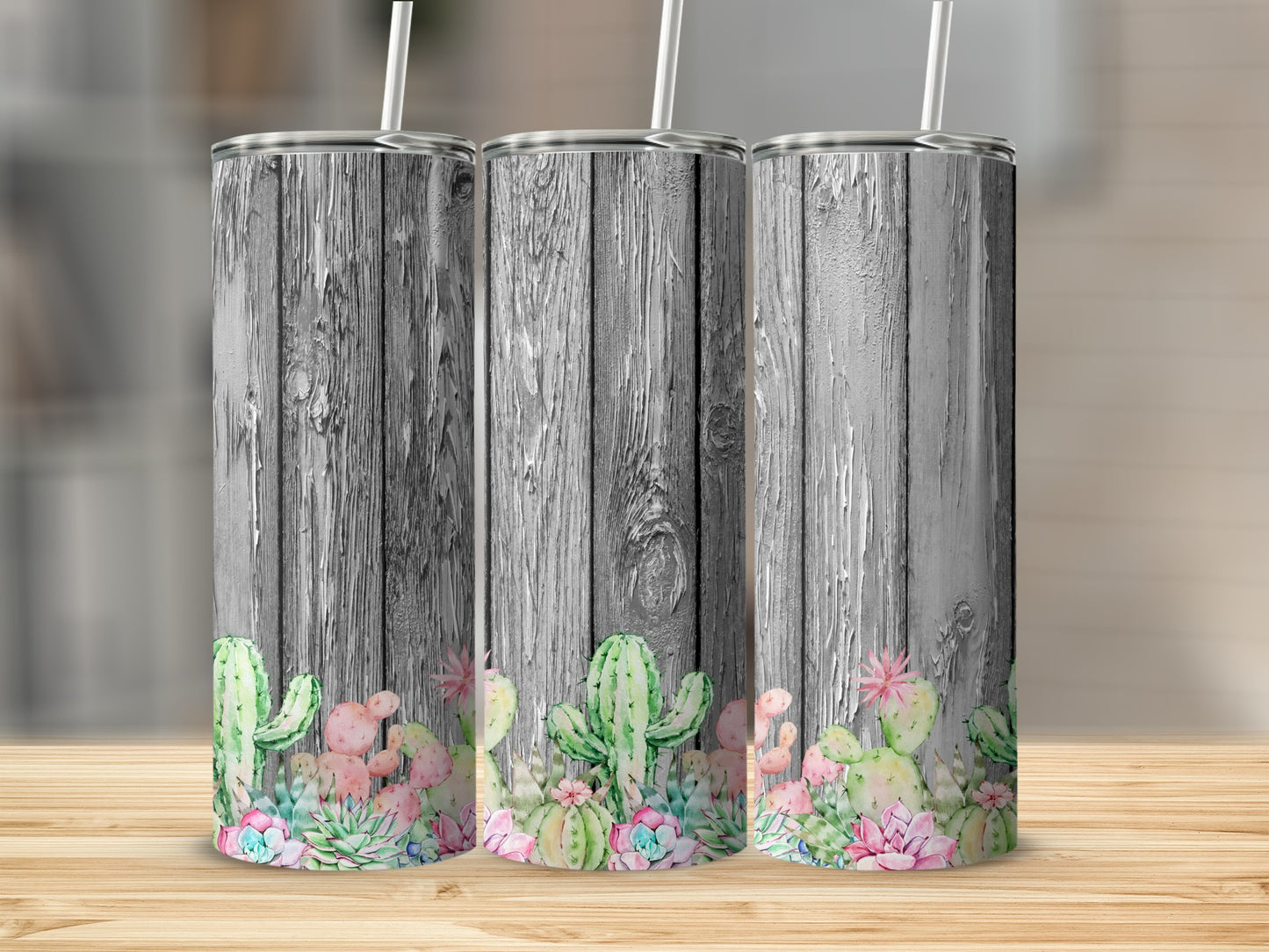 Three tumblers with a wood grain design and succulent accents.