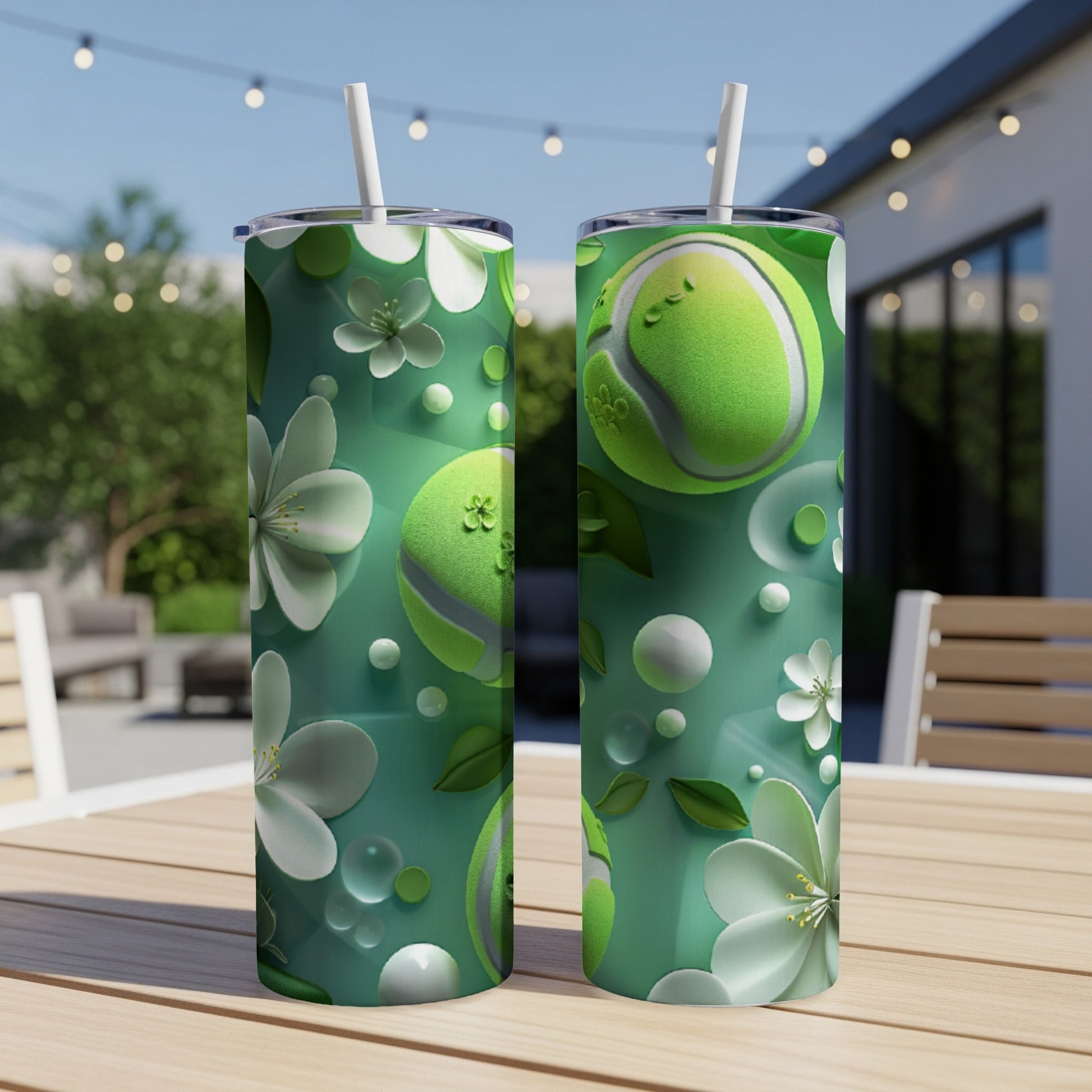 Green tumblers with tennis balls and floral pattern.