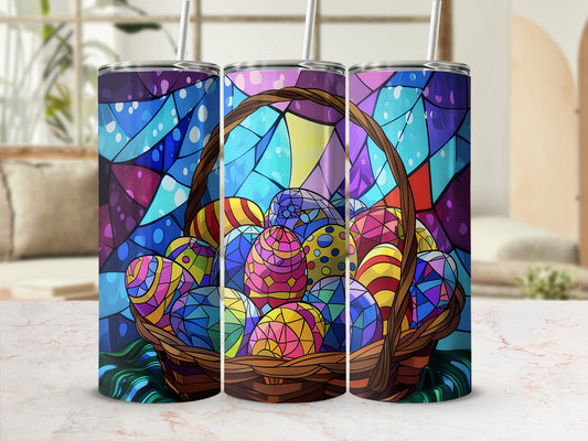 Easter basket filled with colorful, stained-glass-patterned eggs, with straw visible.