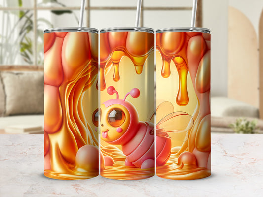 Pink bumblebee on a honey-themed tumbler with dripping honey.