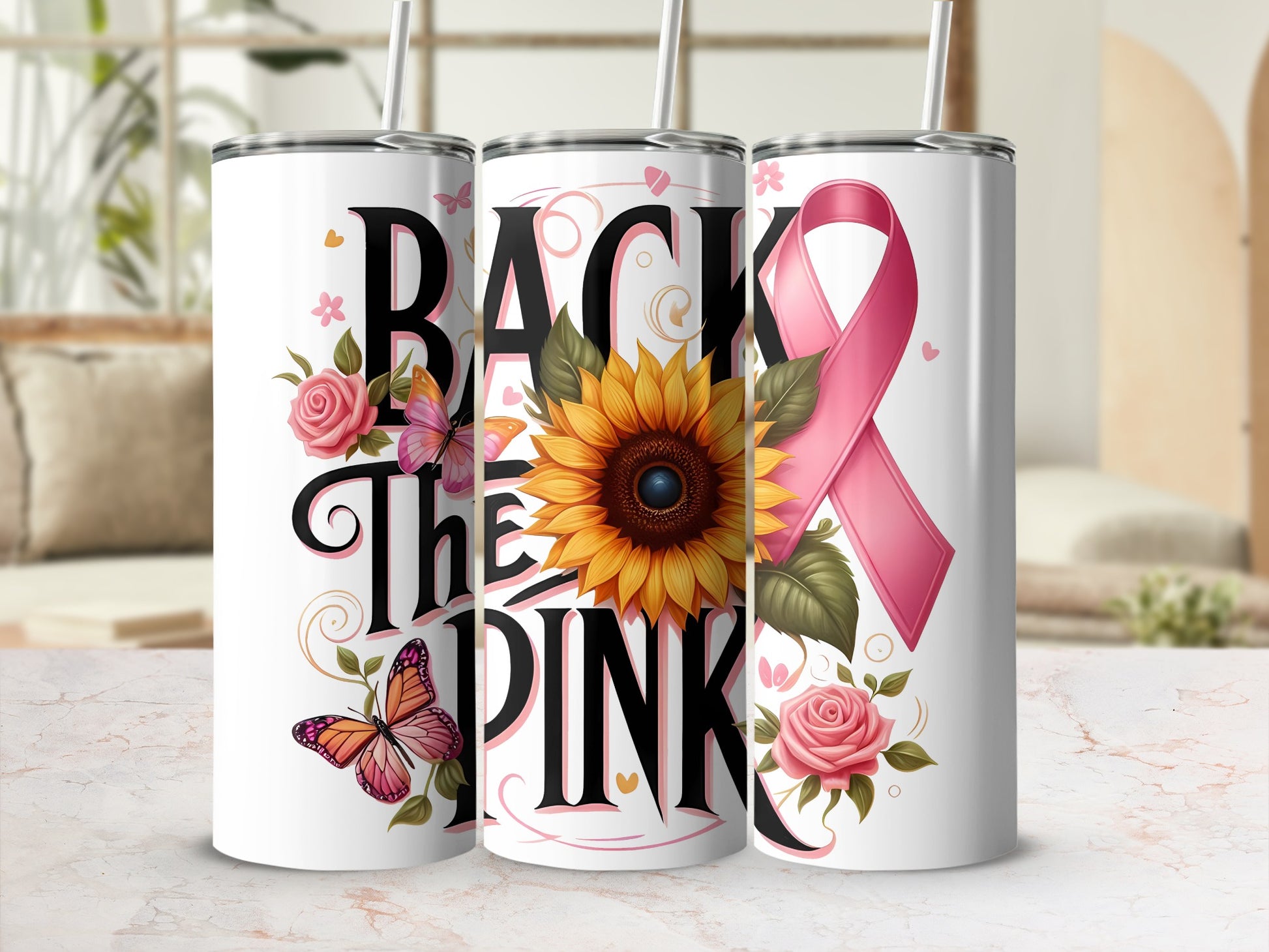 Three tumblers featuring "BACK THE PINK" and floral graphics.