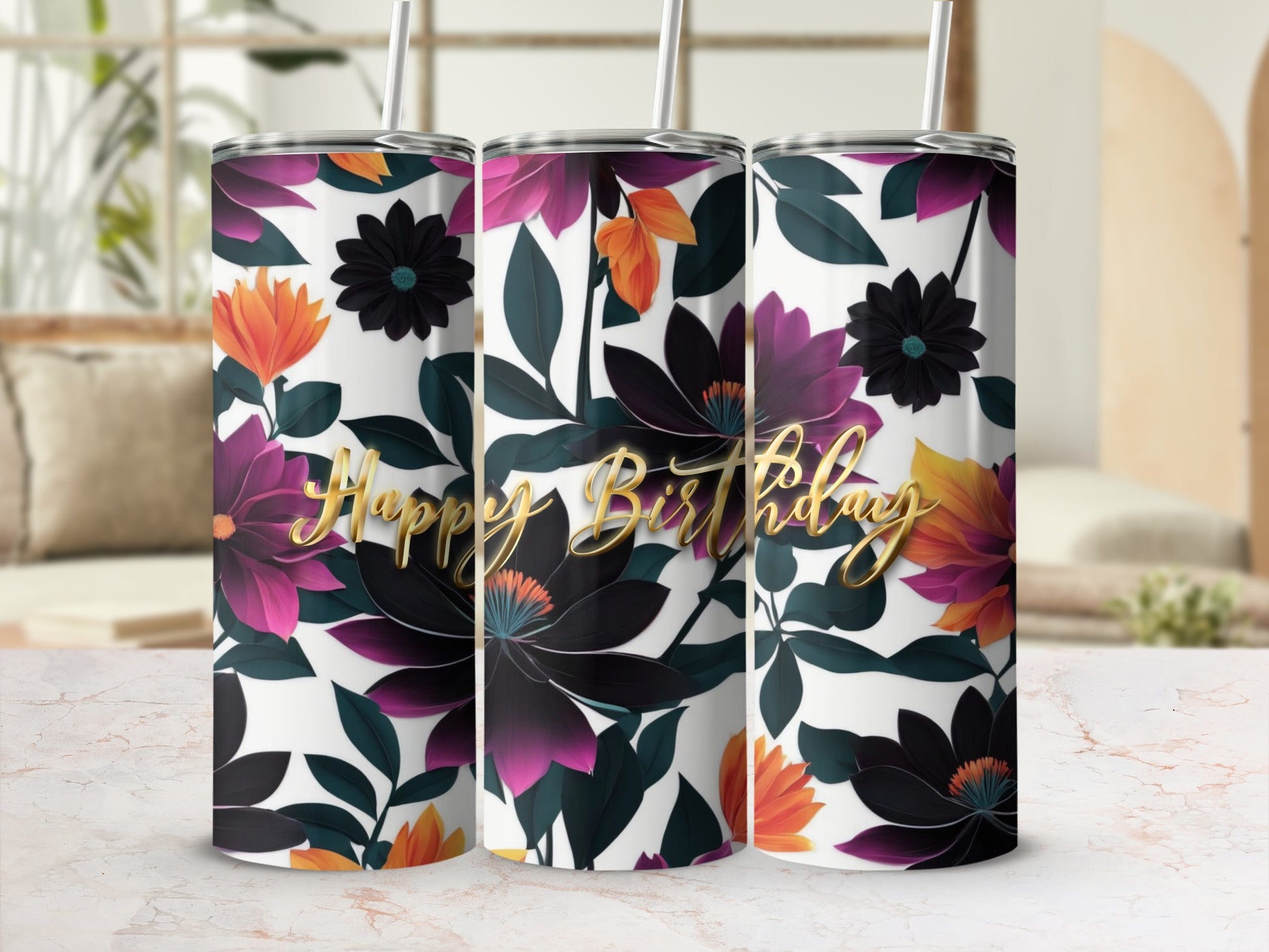 Happy Birthday tumbler with floral design and gold lettering.