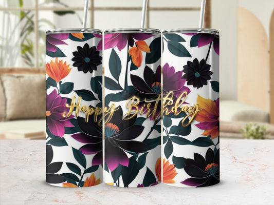 Happy Birthday tumbler with floral design and gold lettering.