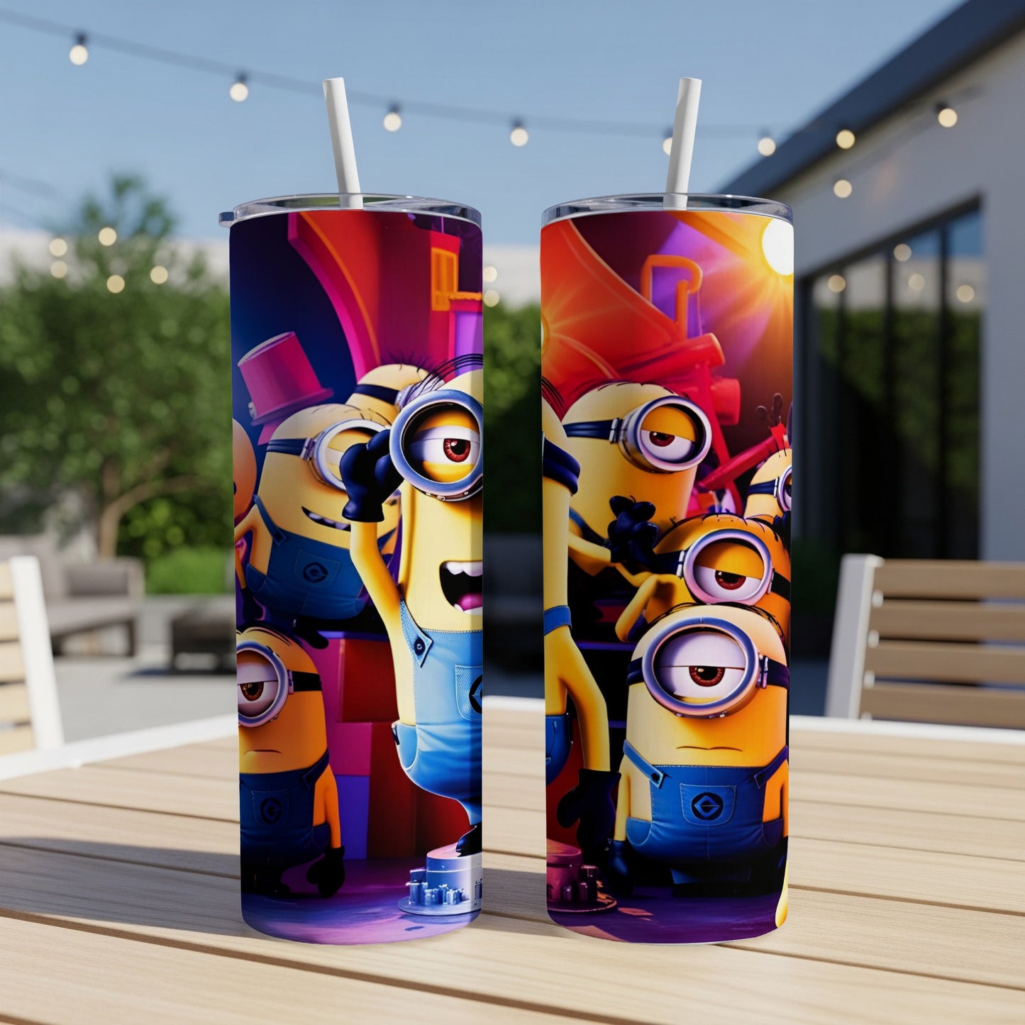 Two Minions tumblers with colorful cartoon characters displayed outdoors on a table.