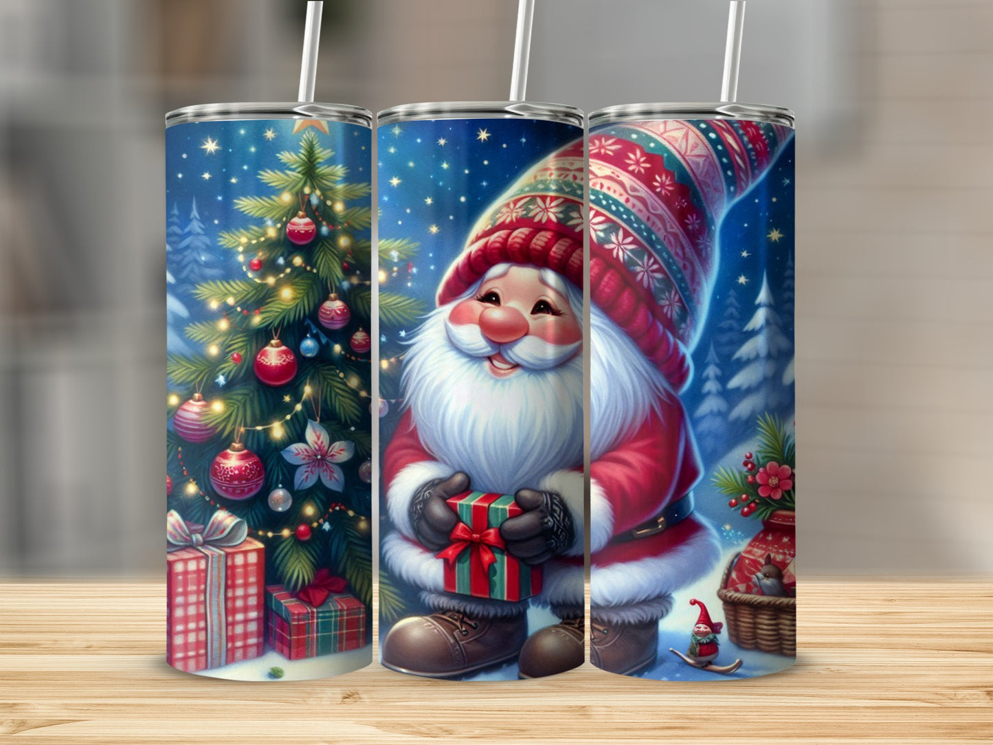 Three tumblers with festive Christmas designs, including a gnome and a decorated tree.