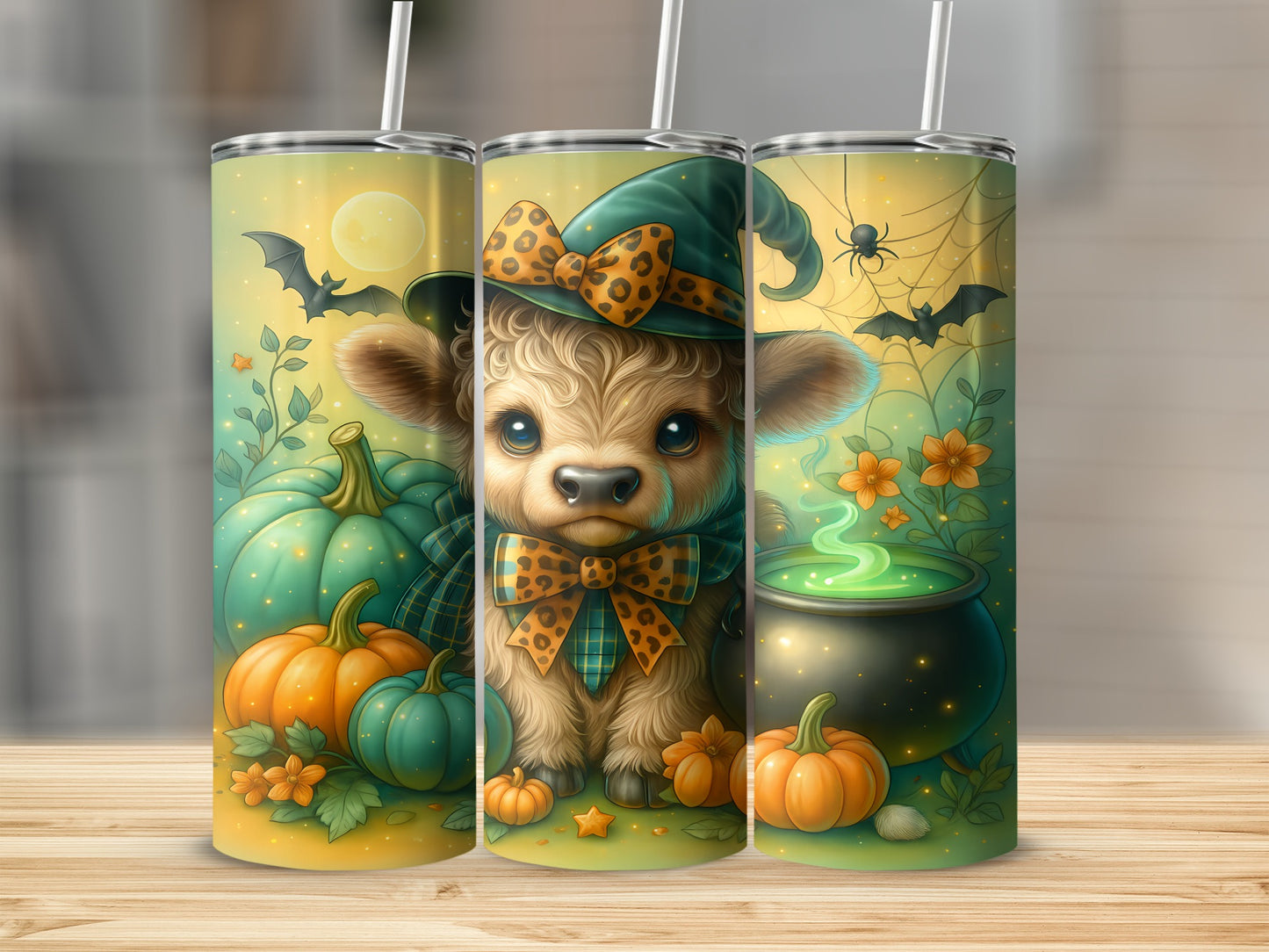 Halloween cow wearing witch hat, surrounded by pumpkins and a cauldron.