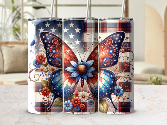 Butterfly tumbler with patriotic stars and floral accents, set against plaid.