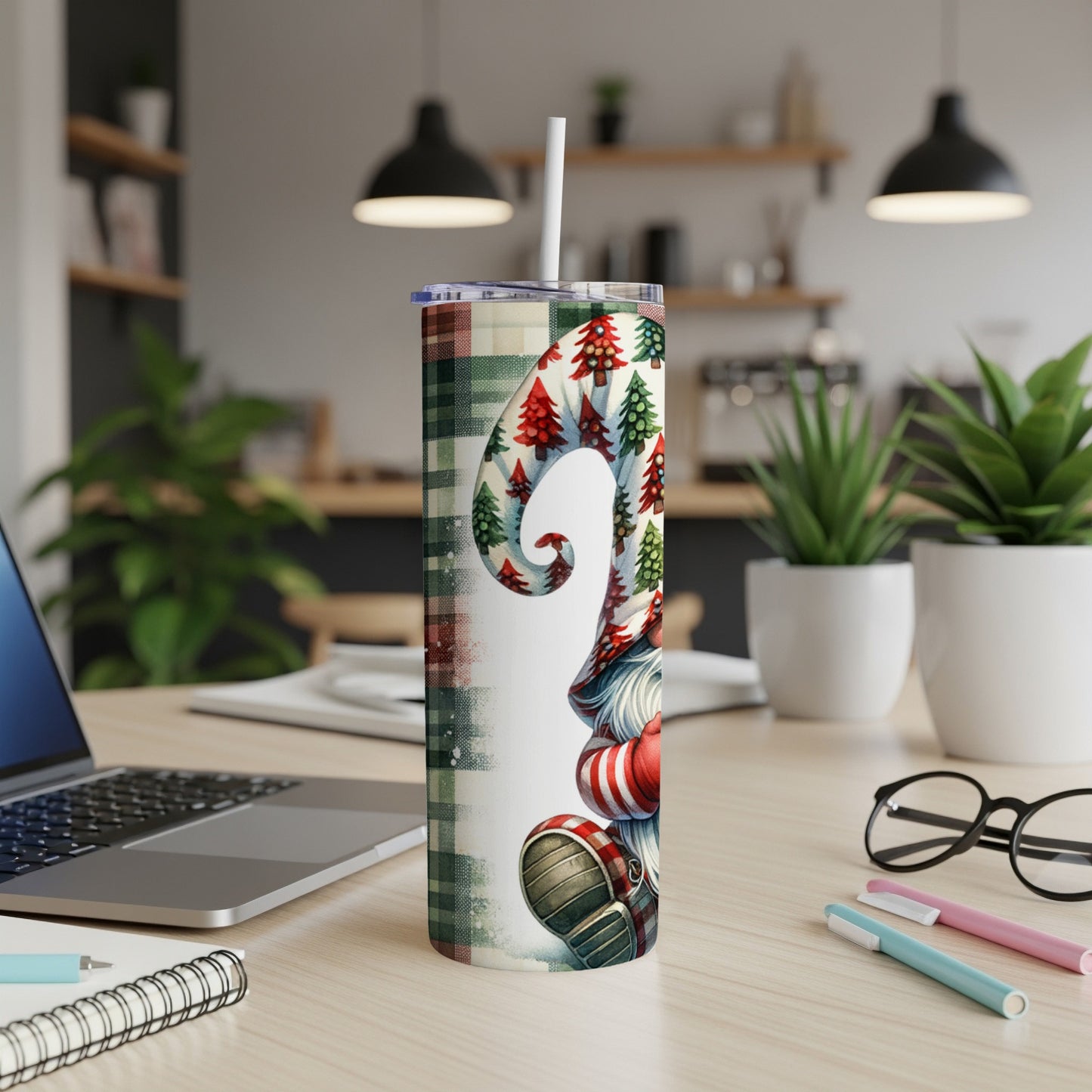 Gnome with festive trees and plaid pattern on a white tumbler.