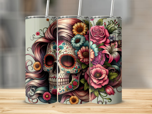 Sugar skull with colorful flowers and long flowing hair on a tumbler.
