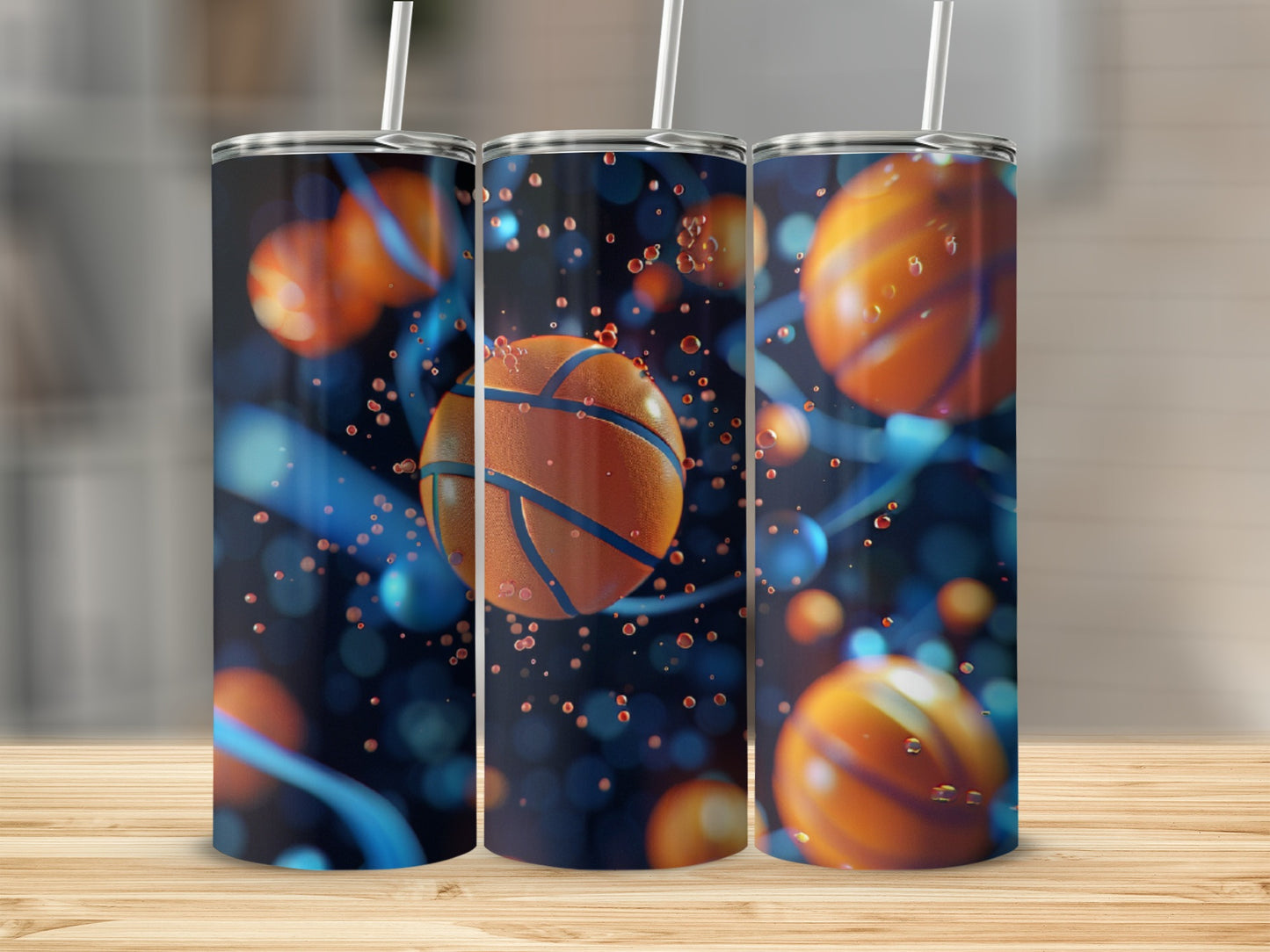Three tumblers with basketball and water droplet design.