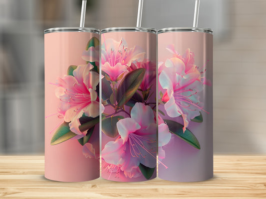 Three pink floral tumblers with straws on a wooden surface.