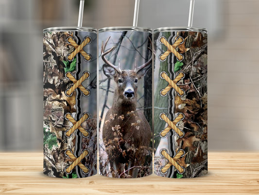 Camouflage tumbler with deer, leaves, and lacing design.