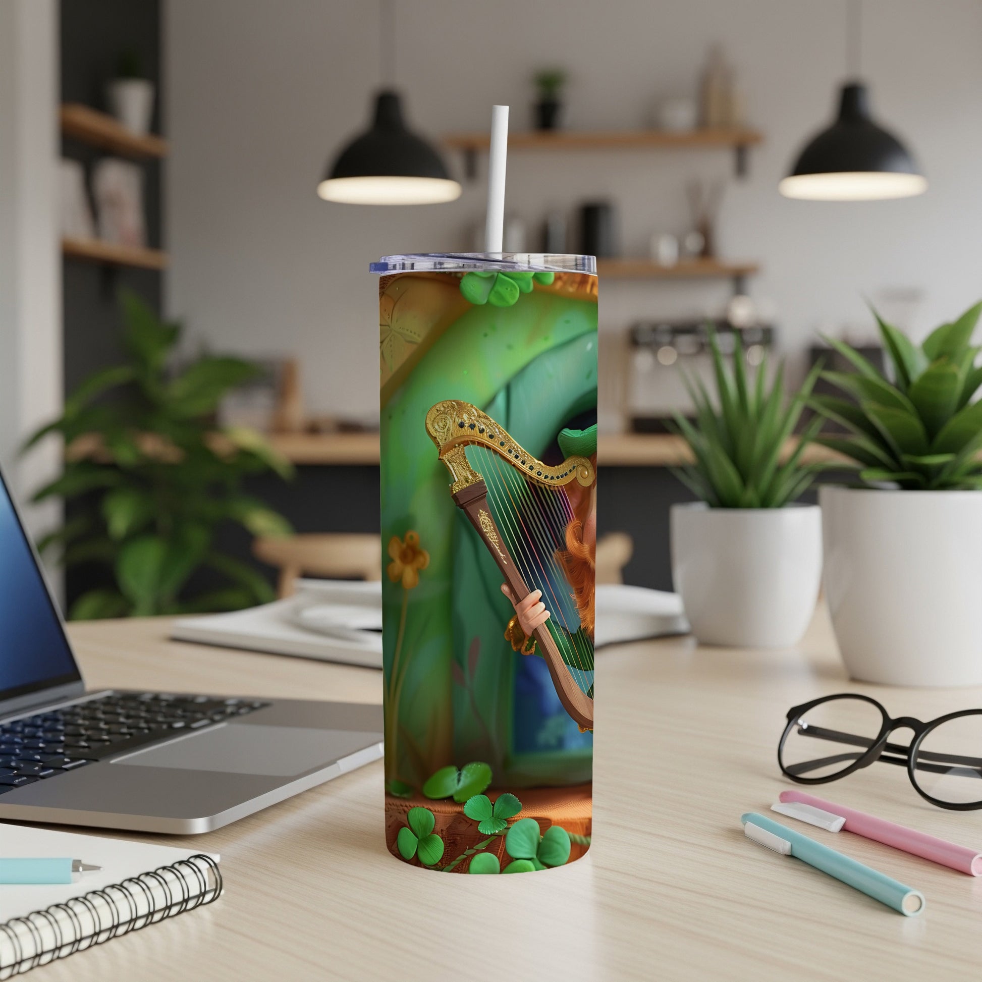Green tumbler featuring a stylized Irish harp with a woman's hand playing it.