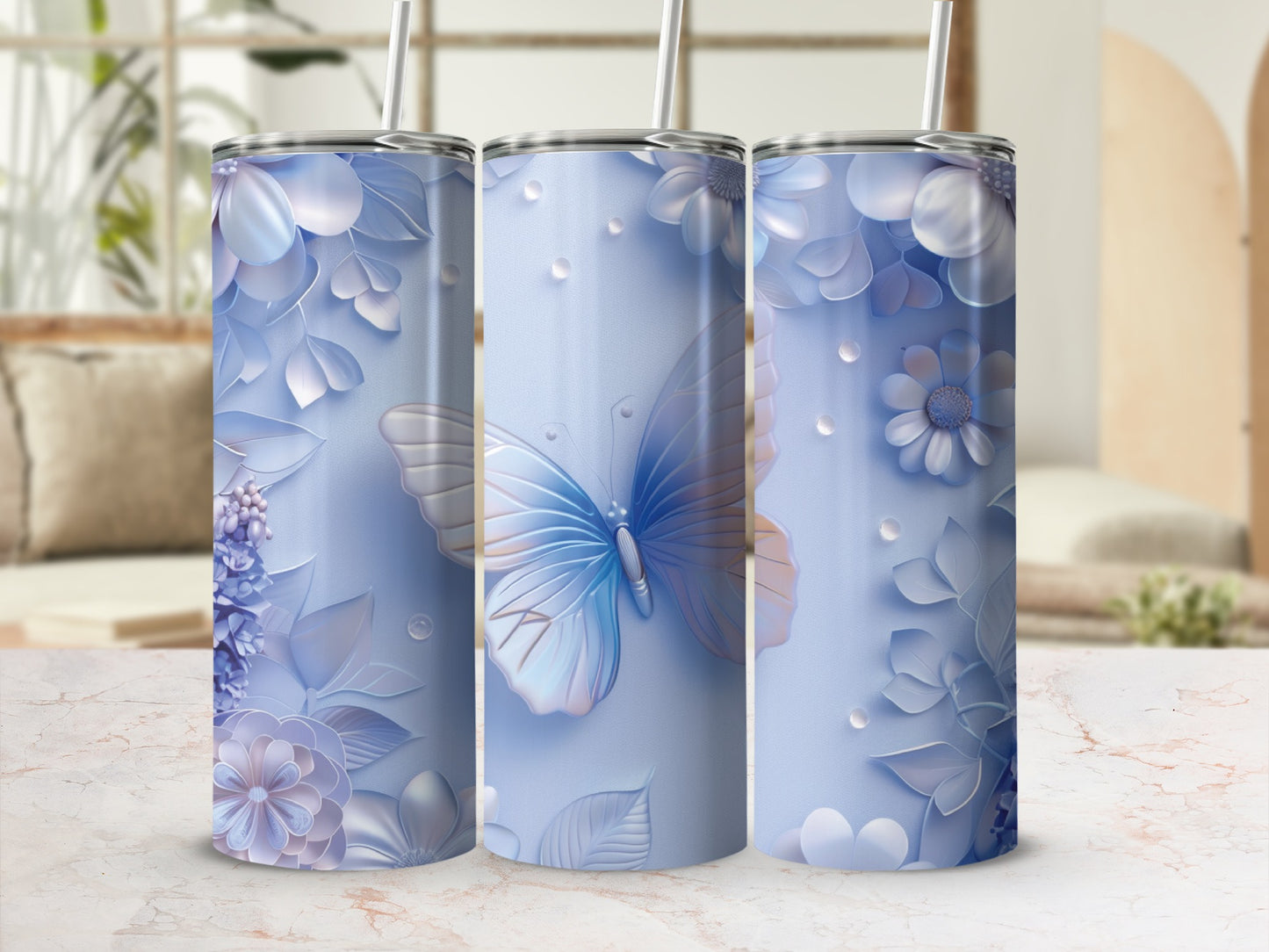 Light blue tumbler with floral and butterfly design.