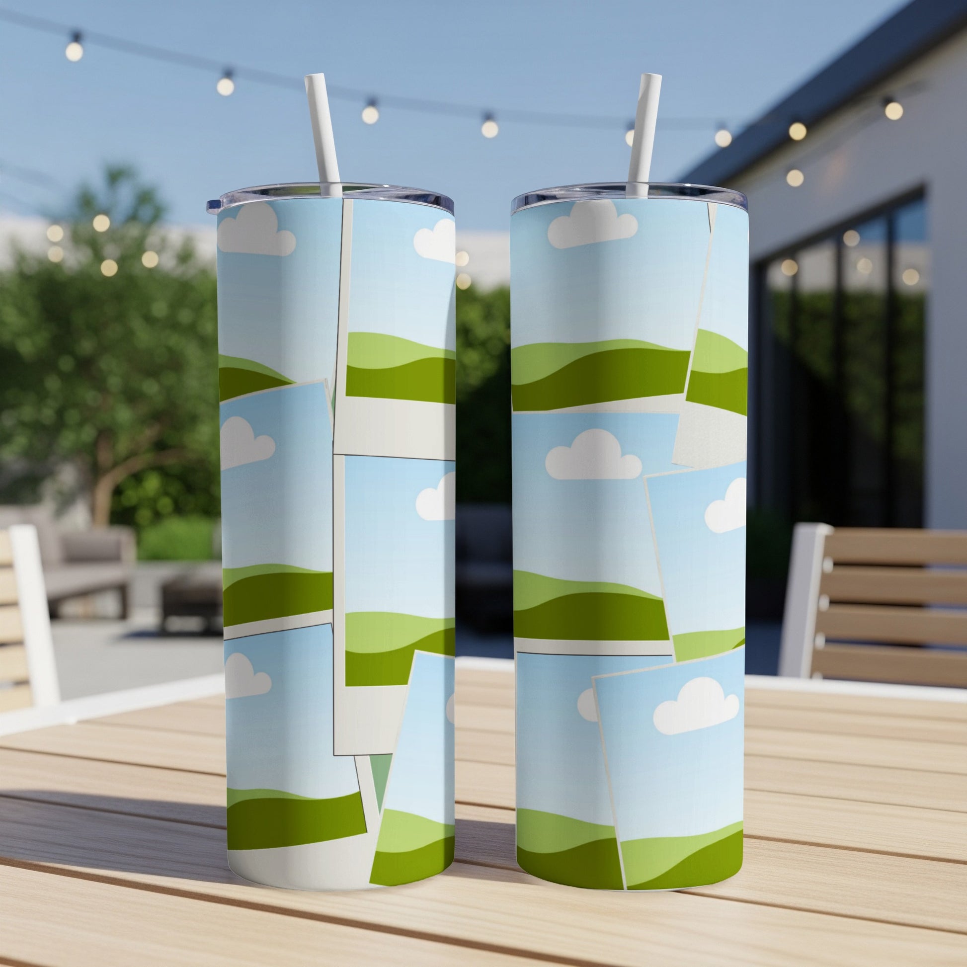 Two tumblers with a collage of landscape images featuring clouds and green hills.