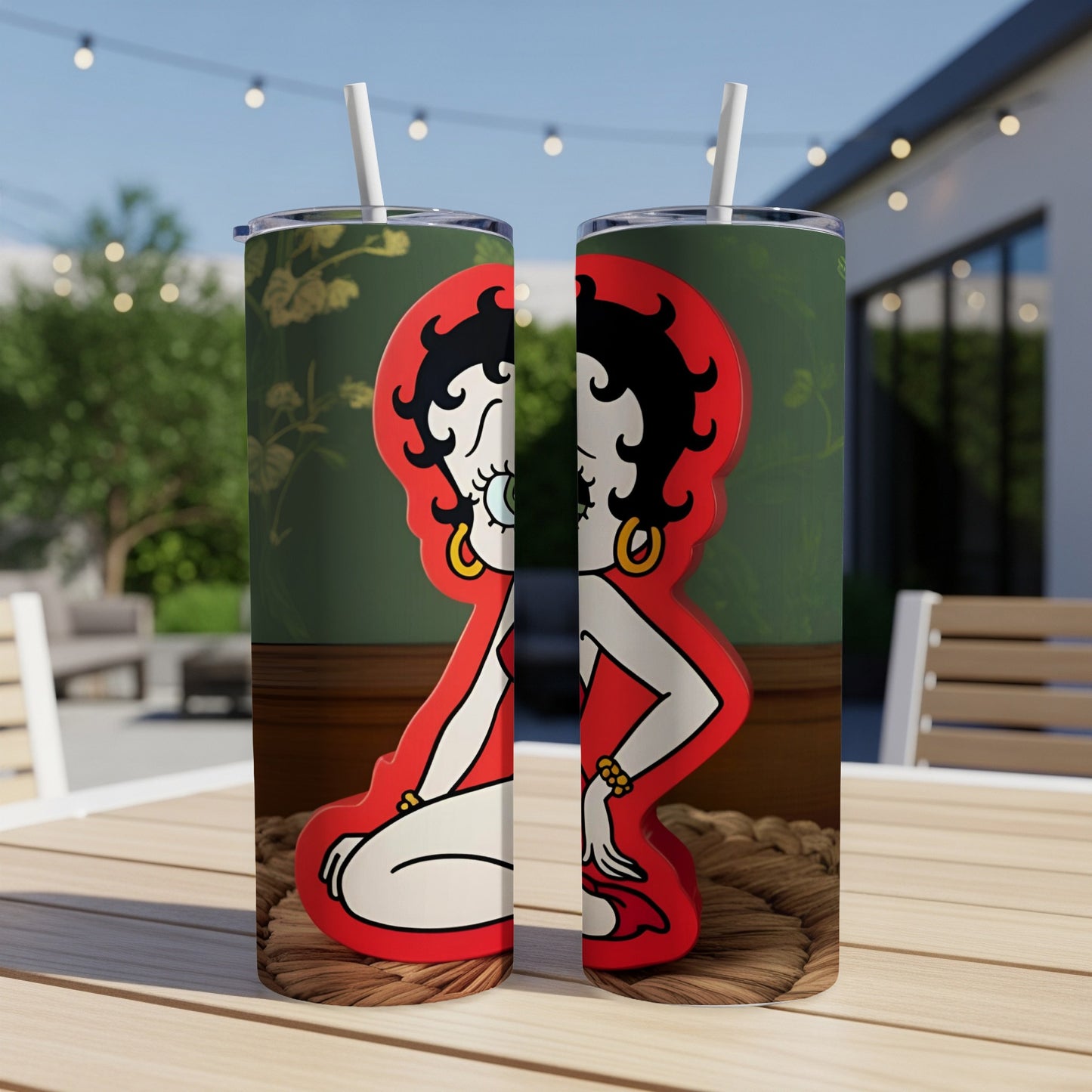 Betty Boop character illustration on two identical stainless steel tumblers.