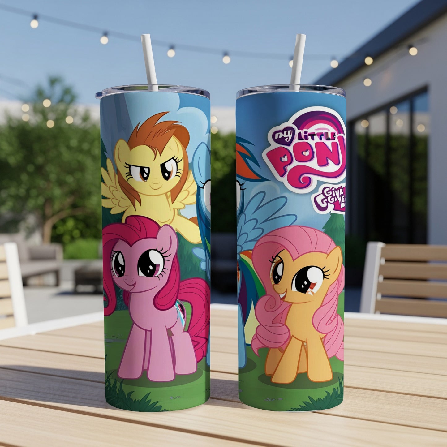 Two My Little Pony tumblers with Pinkie Pie, Rainbow Dash, and Fluttershy on a grassy background.
