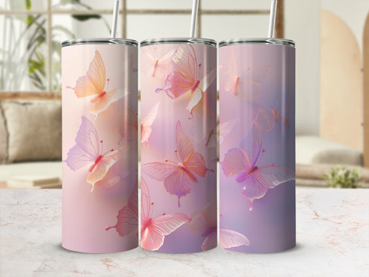 Three pastel tumblers with delicate, translucent butterflies.