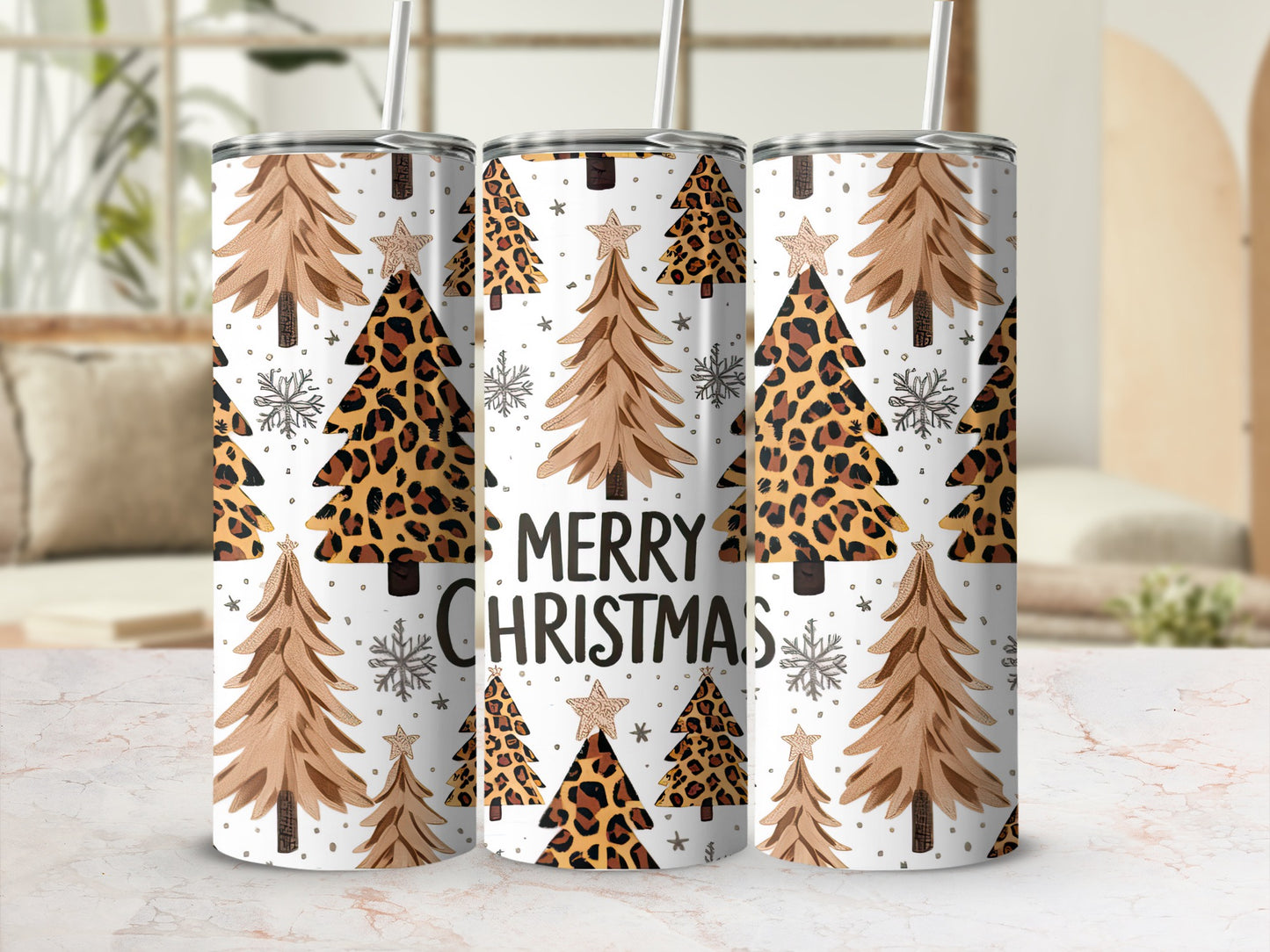 Three tumblers with Christmas trees and leopard print, reading "Merry Christmas".