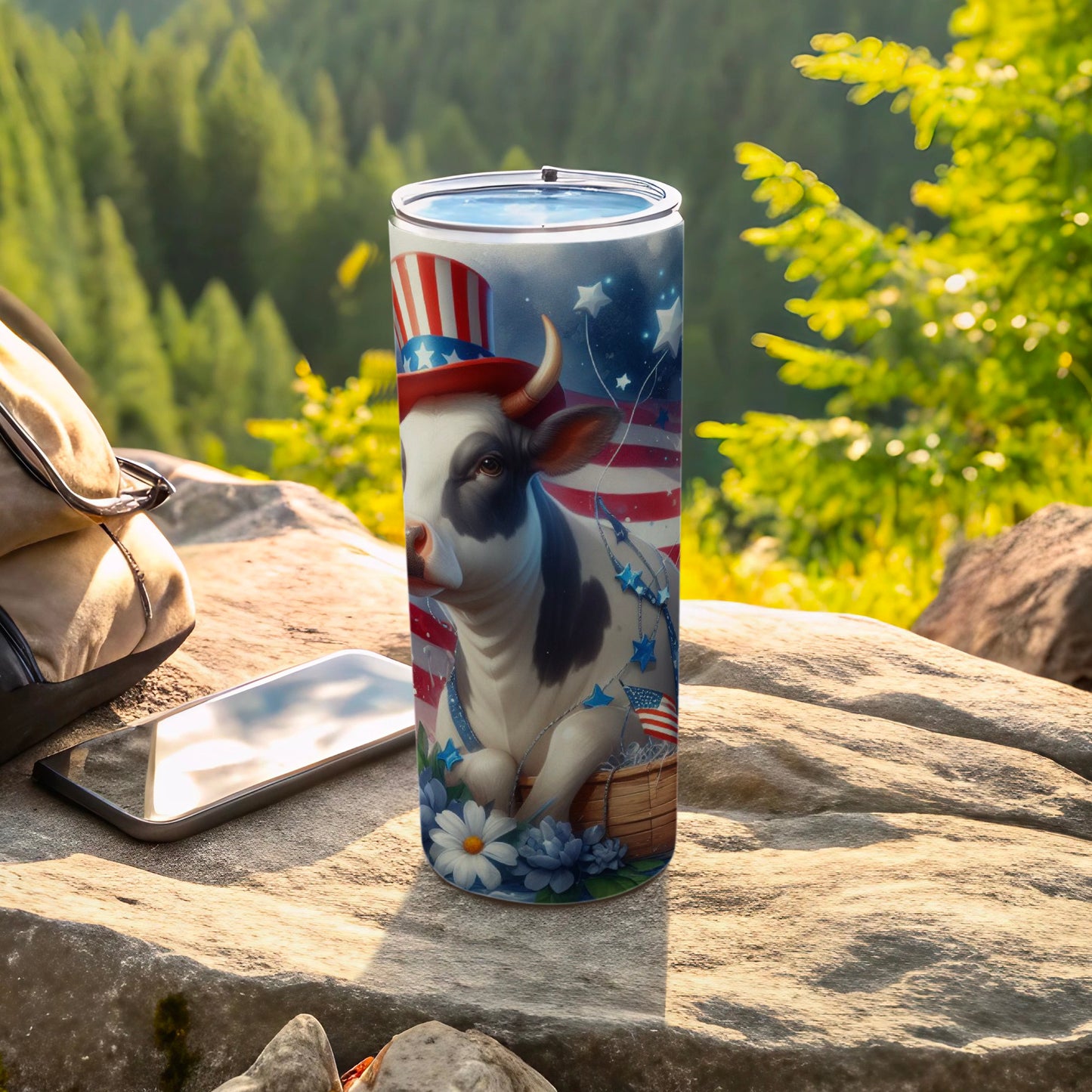 Cow wearing patriotic hat and bandana on a tumbler.