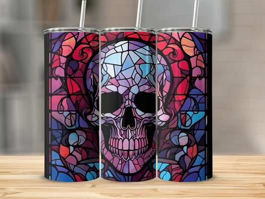 Skull stained glass tumbler with colorful geometric patterns.