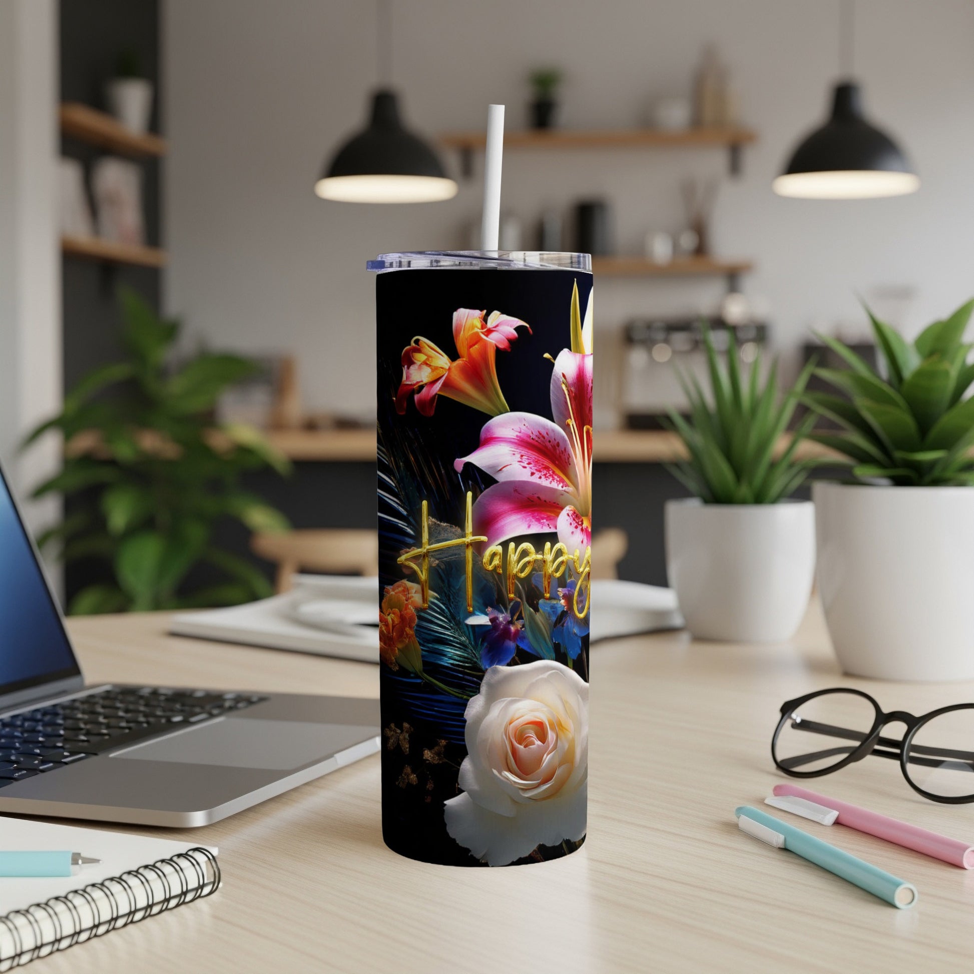 Black tumbler with floral design and "Happy" text.