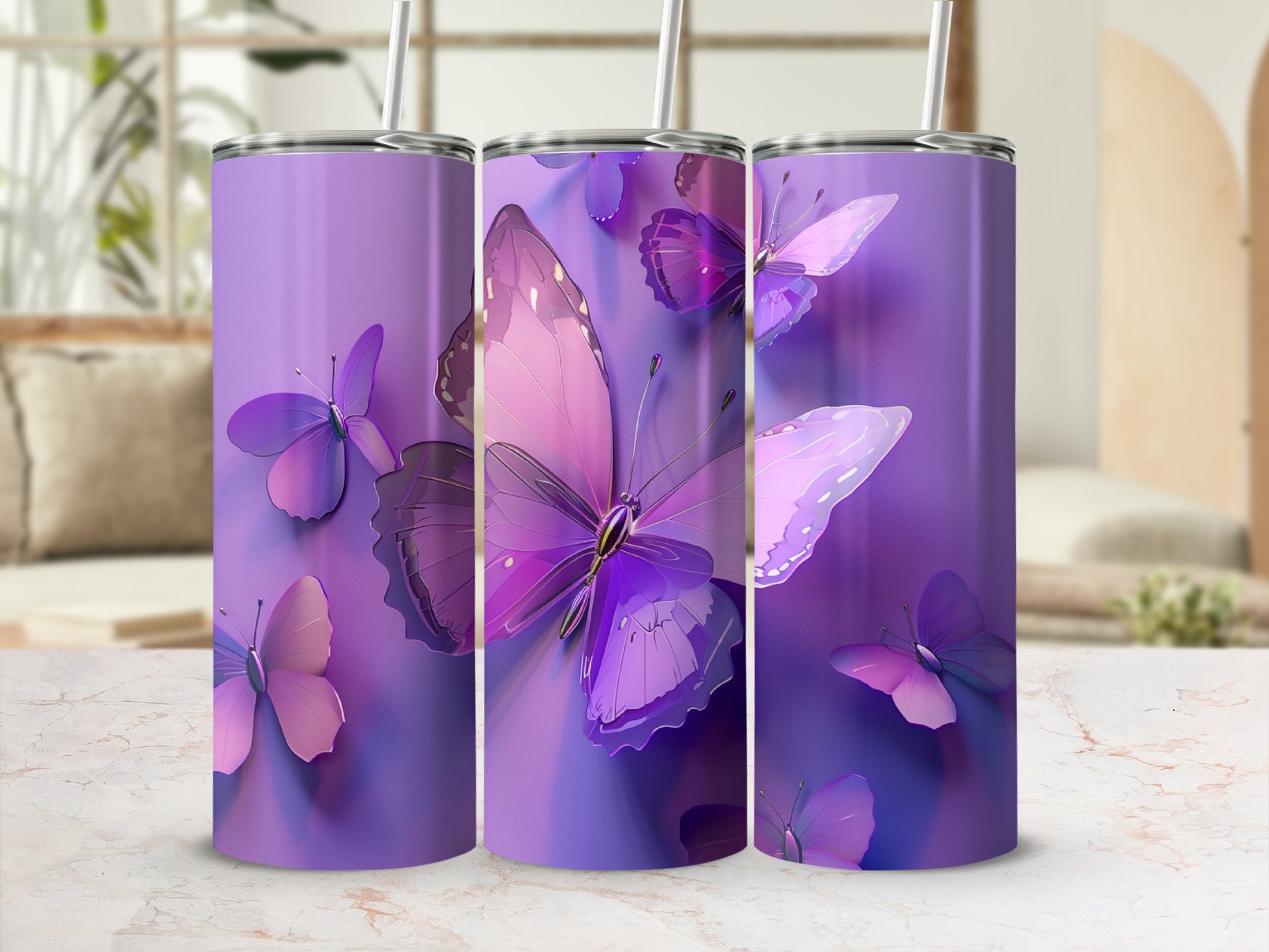 Purple tumblers with iridescent butterflies, displayed on a marble countertop.