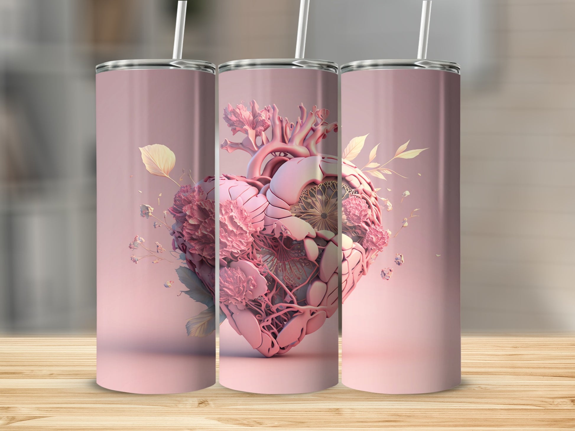 Pink tumbler with a heart-shaped floral anatomical design.